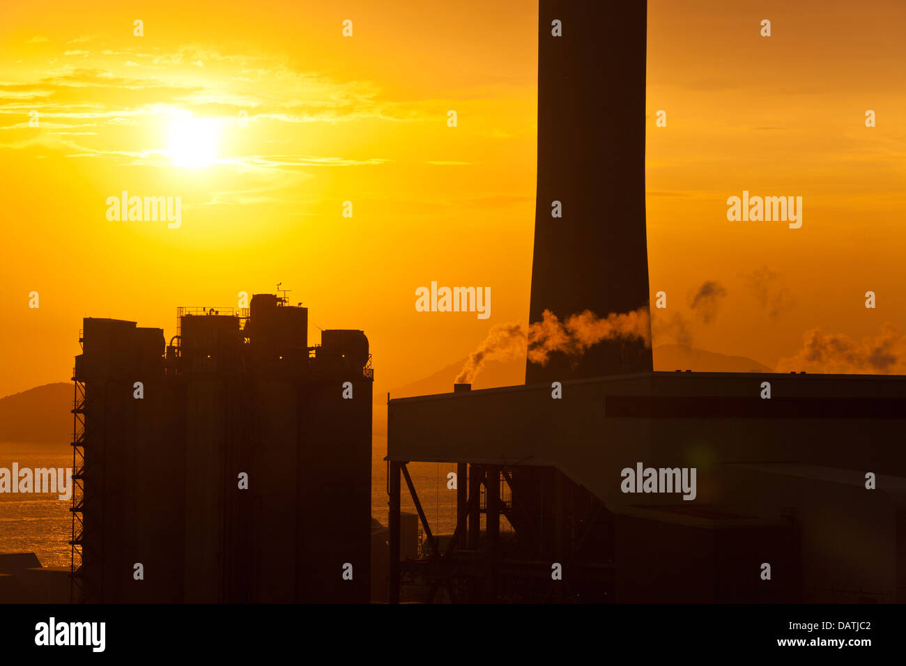 Air pollution from factories in sunset Stock Photo Alamy