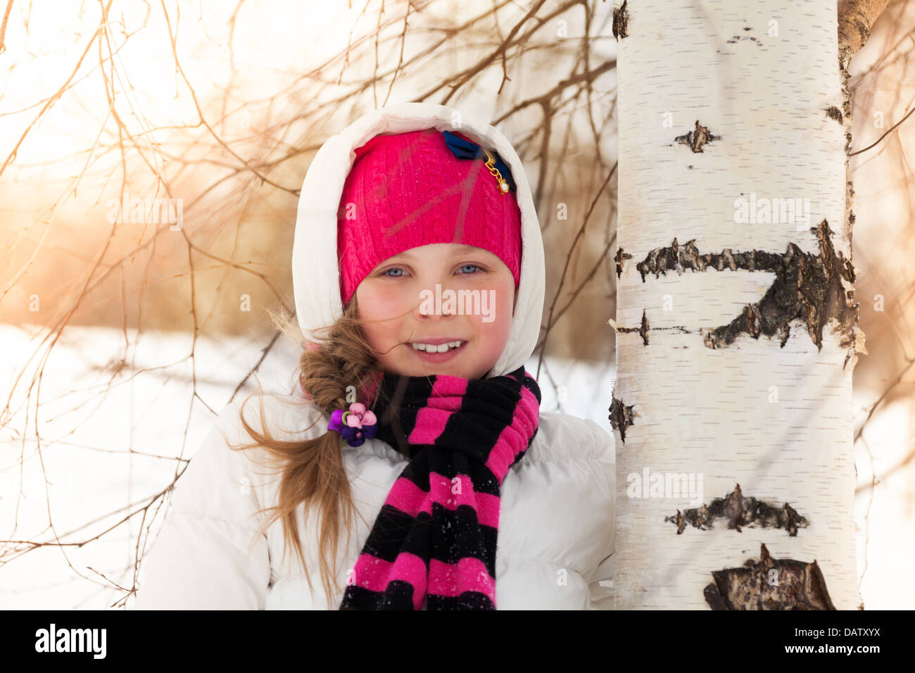 Close portrait happy cute little girl in birch forest at winter Stock ...