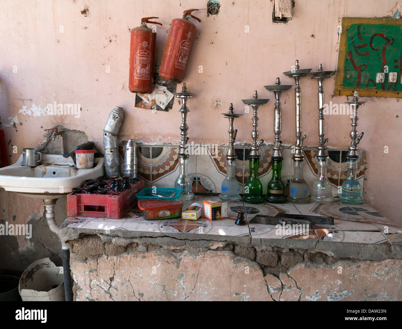 Detail of outside of an Egyptian roadside cafe showing sink and shisha area Stock Photo