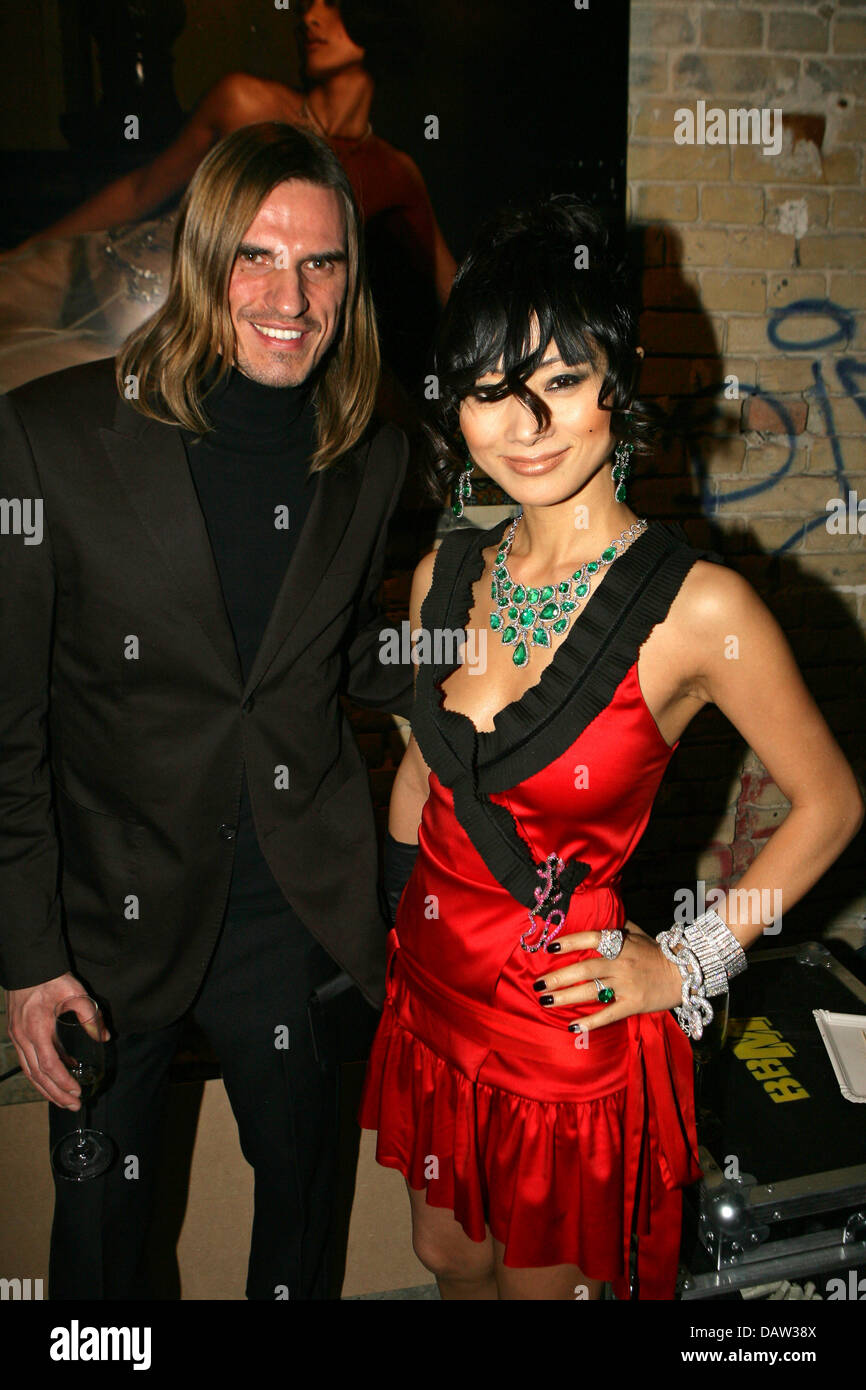 Chinese actress Bai Ling and photographer Udo Spreitzenbarth poses in a