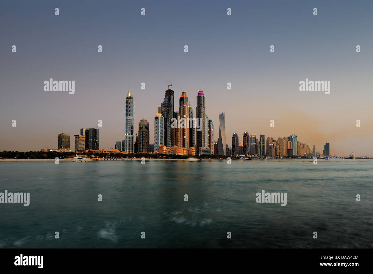 Dubai Marina, UAE at dusk as seen from Palm Jumeirah, this skyline view ...