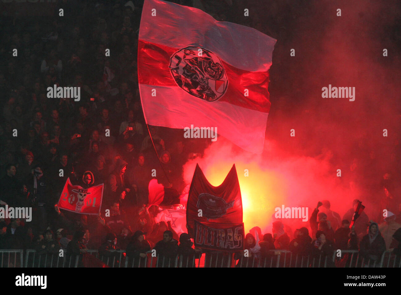 The picture shows a group of supporters of Dutch club Ajax Amsterdam prior to the first leg of the UEFA Cup first knockout round tie against SV Werder Bremen at the Weser stadium in Bremen, Germany, Wednesday, 14 February 2007. Three second half goals from Bremen gave the German side a 3-0 win over 10-man Ajax. Photo: Carmen Jaspersen Stock Photo