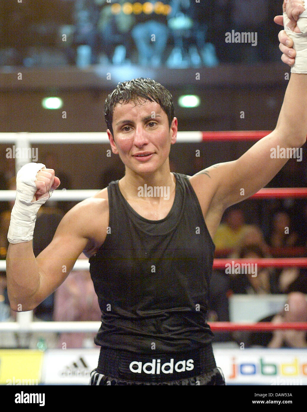 German Julia Sahin is declared winner over Russian Anastasia Toktaulova in the WIBF Junior Flyweight title bout in Duesseldorf, Germany, 27 January 2007. 32-year-old Sahin won the title by unanimous decision after the full distance of 10 rounds. Photo: Felix Heyder Stock Photo