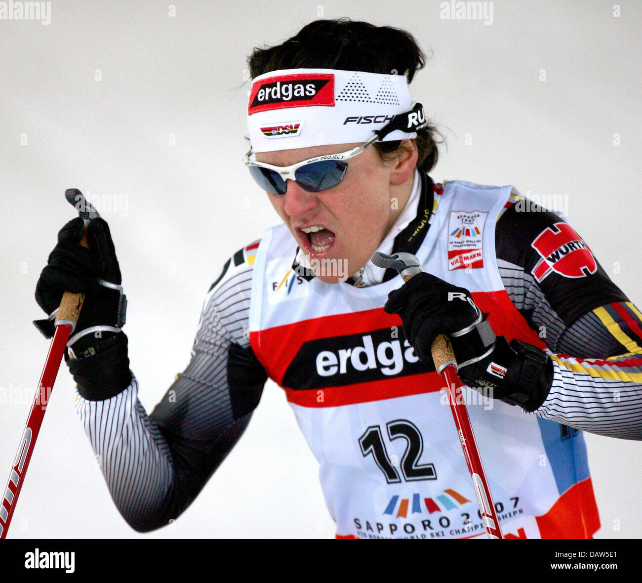 German Nordic combined athlete Manuela Henkel arrives at the finish