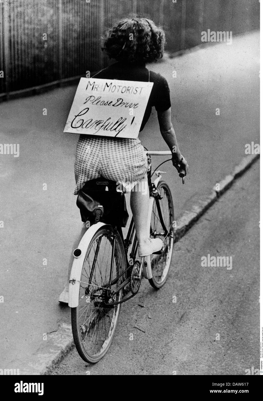 transport / transportation, bicycle, woman with sign 'Mr. Motorist please drive carefully', early 1950s, , Additional-Rights-Clearences-Not Available Stock Photo