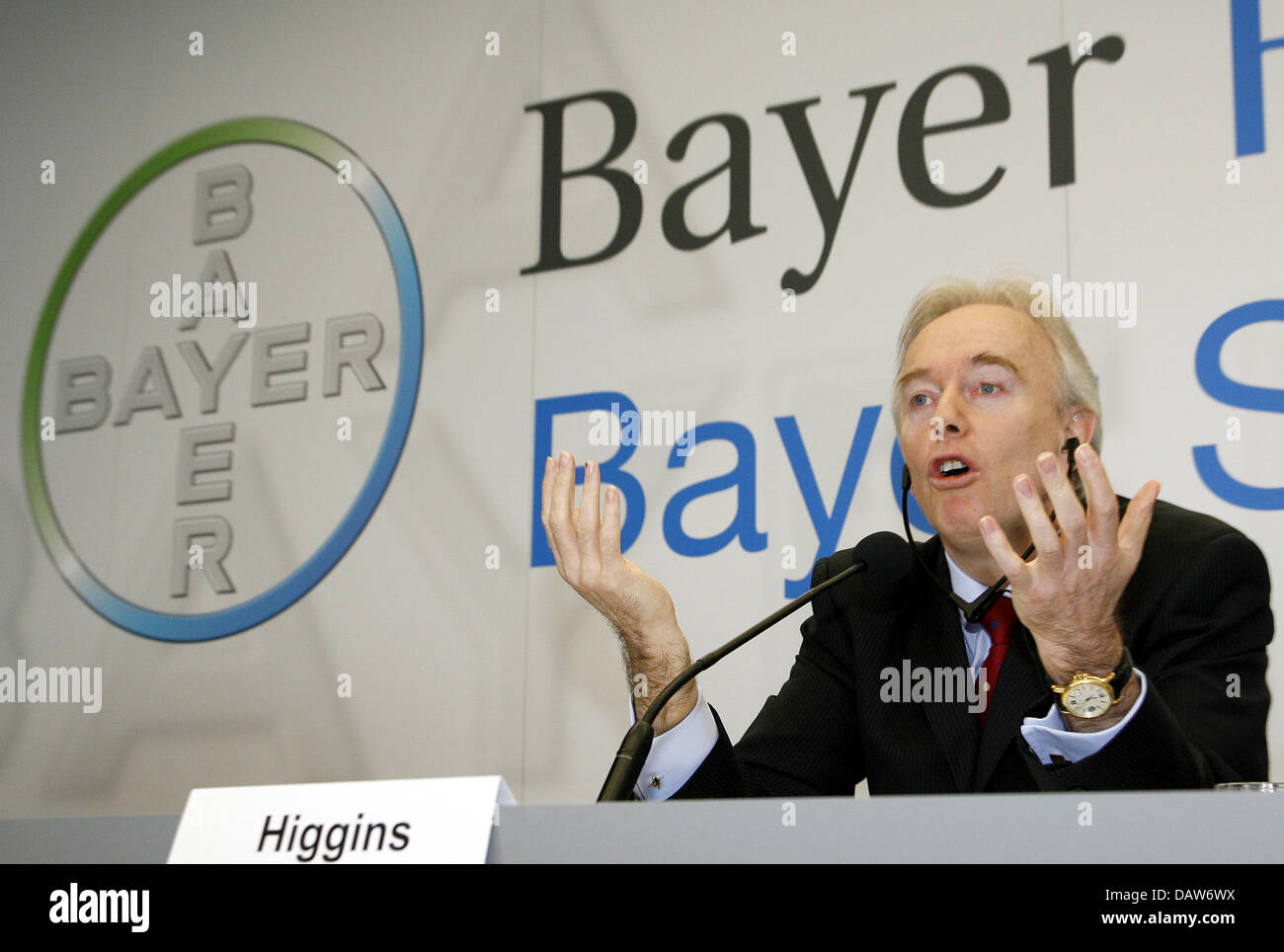 CEO of Bayer Schering Pharma, Arthur Higgins, gestures at a proess