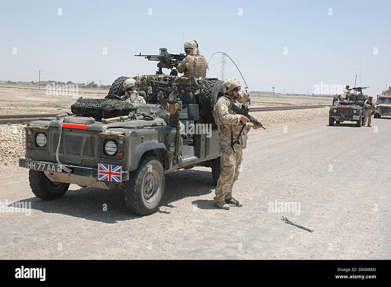 (dpa file) Soldiers of the 1st Queen's Dragoon Guards pictured during a Long Range Desert Patrol in Iraq, June 2006. The soldiers patrol with Land Rover 110 XD Wolf WMIK (Weapon Mount Installation Kit) equipped with two 7.62mm General Purpose Machine Guns (GPMG). Photo: Carl Schulze Stock Photo