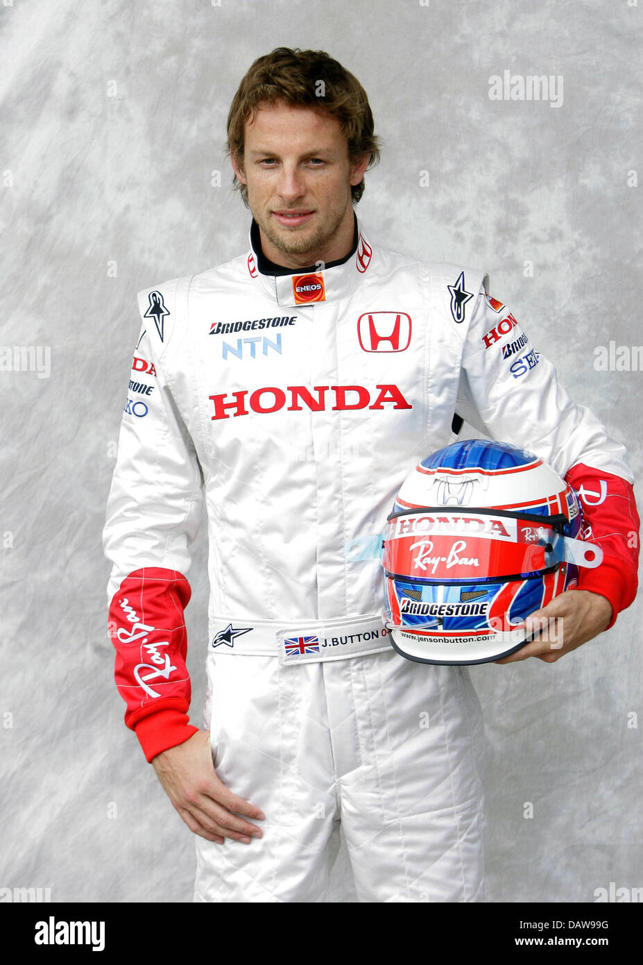 British Formula One pilot Jenson Button of Honda Racing poses for the  photographers during the official photo session to the Australian Grand  Prix at the Albert Park race track in Melbourne, Australia,