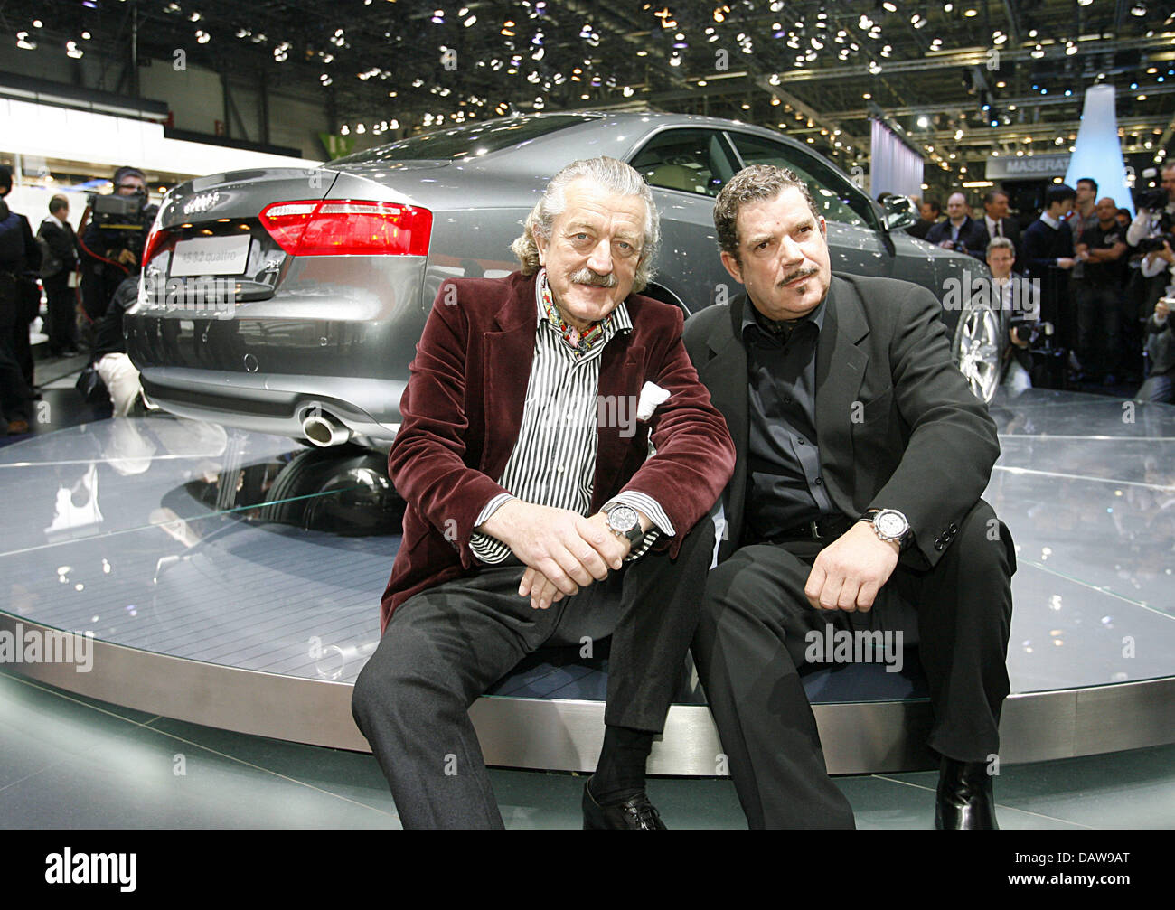 Dieter Meier (L) and Boris Blank of Swiss band 'Yello' sit in front of the  new Audi A5 at the 77th International Motor-Show and Accessories in Geneva,  Switzerland, Tuesday 06 March 2007.