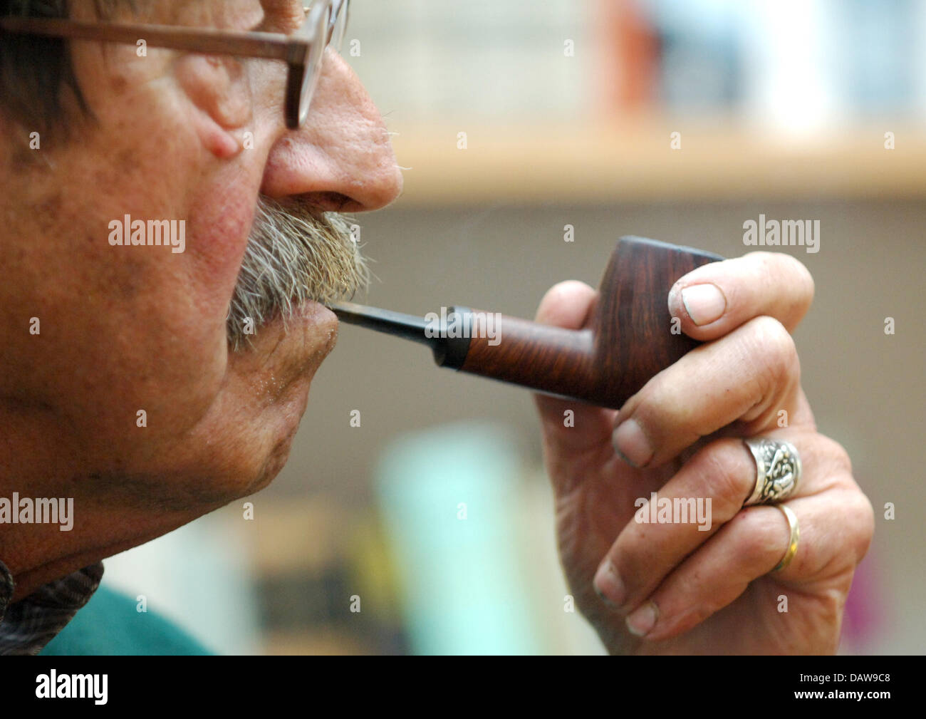 Laureate Of The Nobel Prize In Literature Guenter Grass Smokes A
