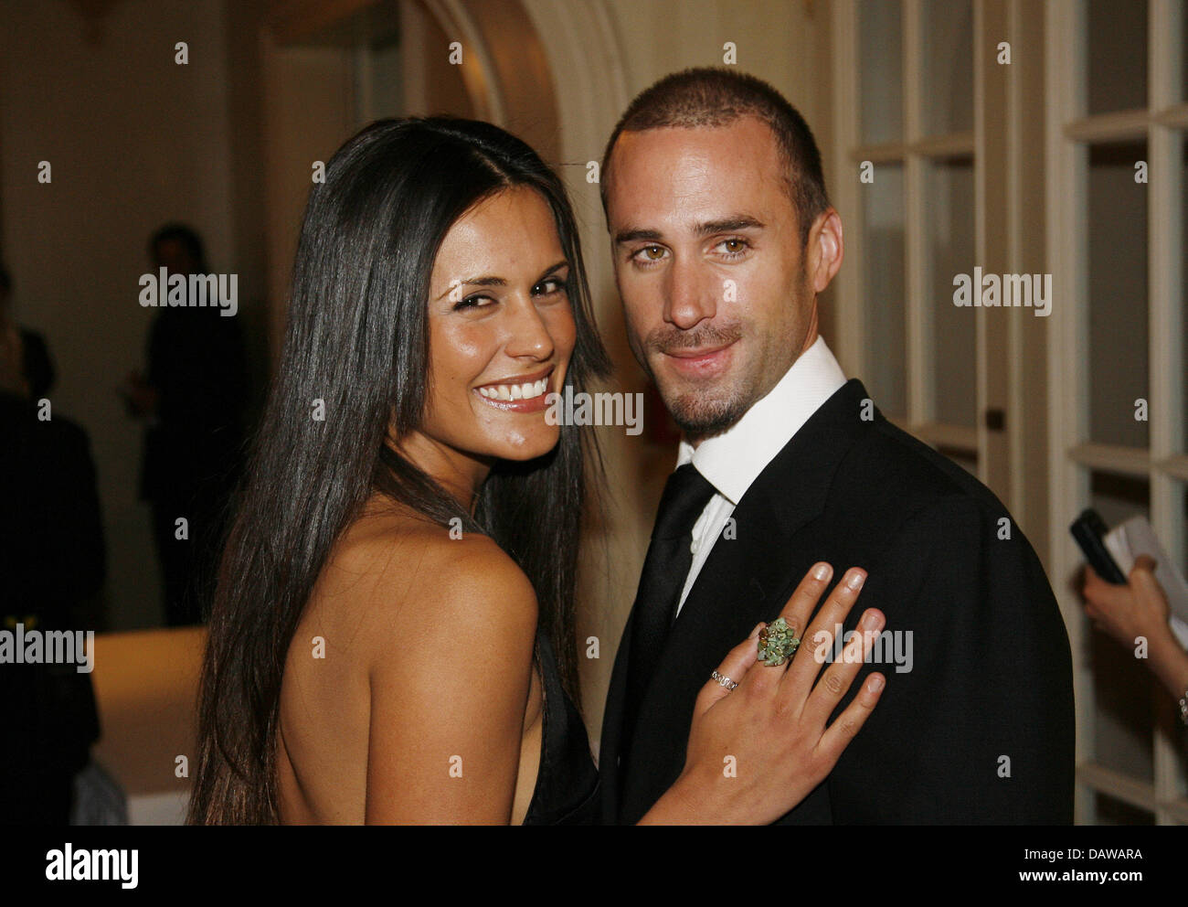 British actor Joseph Fiennes (R) and his girlfriend Swissborn model