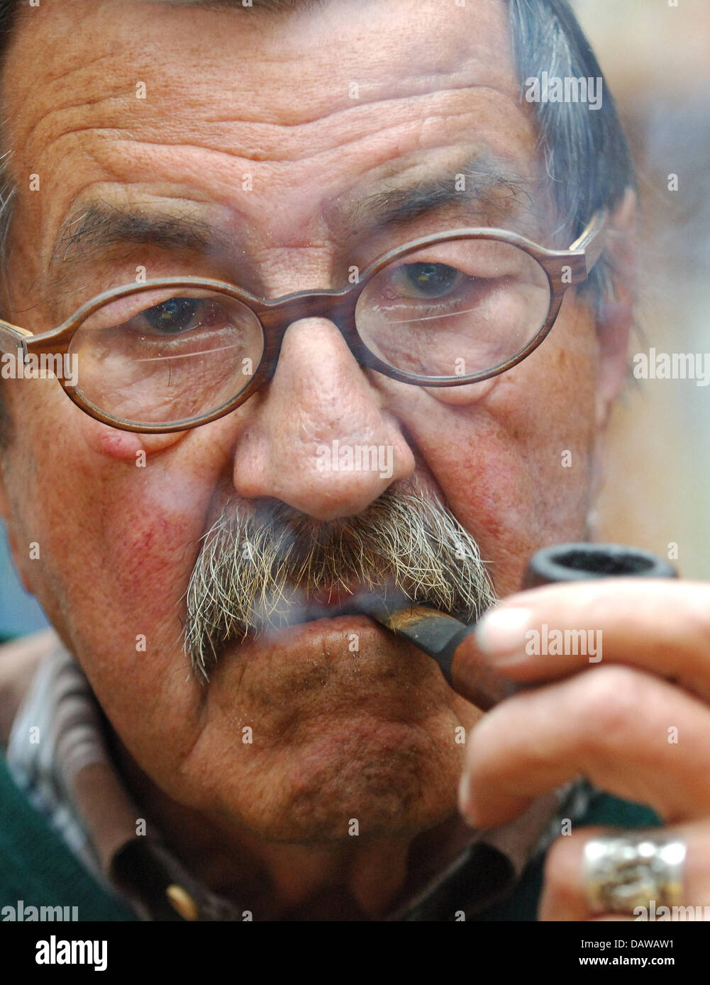 Laureate Of The Nobel Prize In Literature Guenter Grass Smokes A