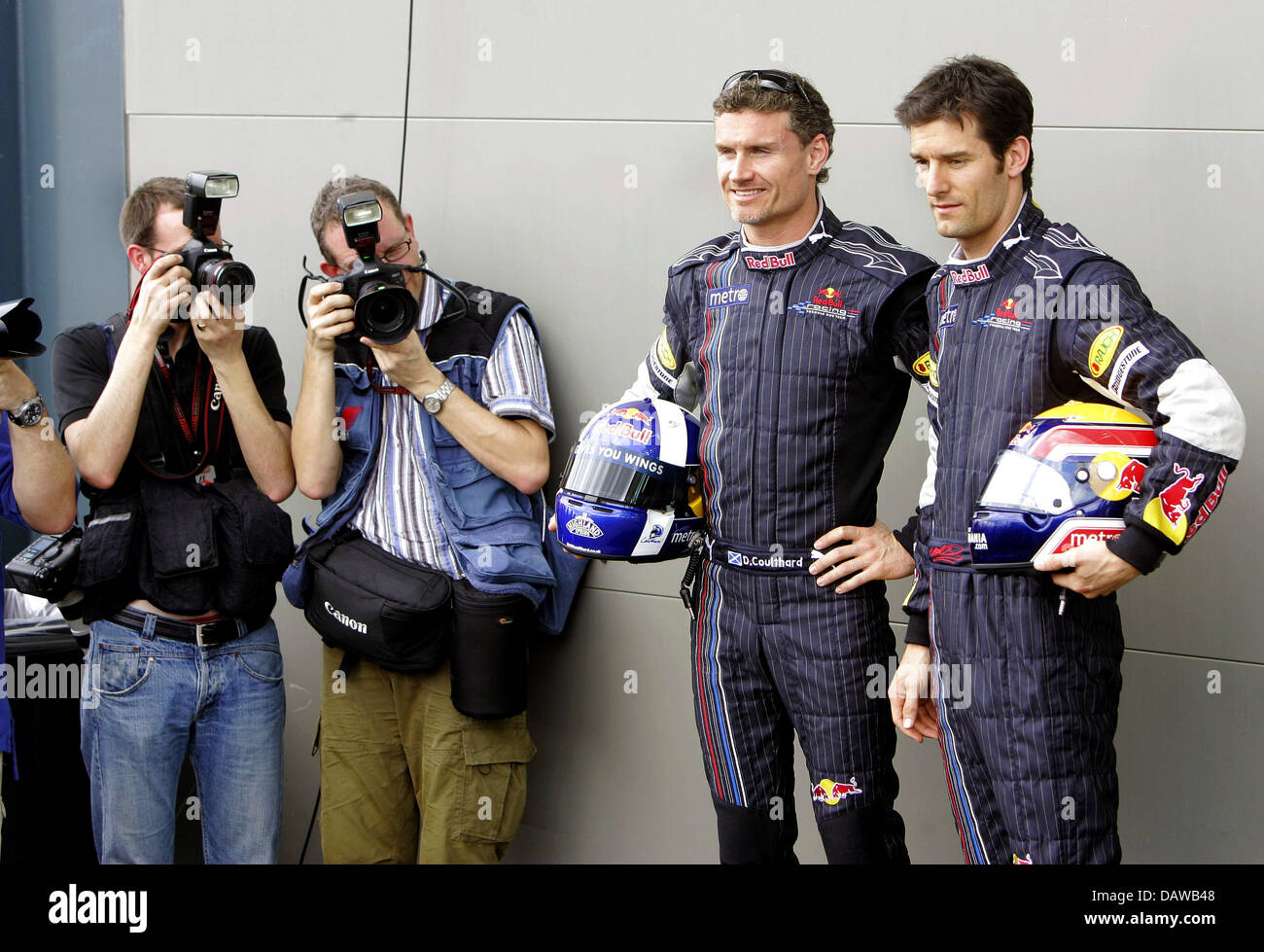 Formula One pilots, Red Bull Racing team-mates British David Coulthard (2ndR) and Australian Mark Webber (R) pose for the cameras at the official photo session to the 2007 Formula 1 Australian Grand Prix at the Albert Park race track in Melbourne, Australia, Thursday 15 March 2007. he first Grand Prix of the 2007 Formula 1 season will take place in Melbourne on Sunday 18 March. Pho Stock Photo