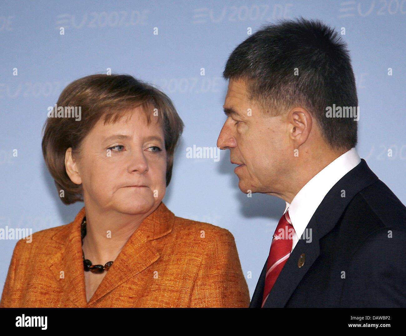 German Chancellor Angela Merkel and her husband Joachim Sauer are ...