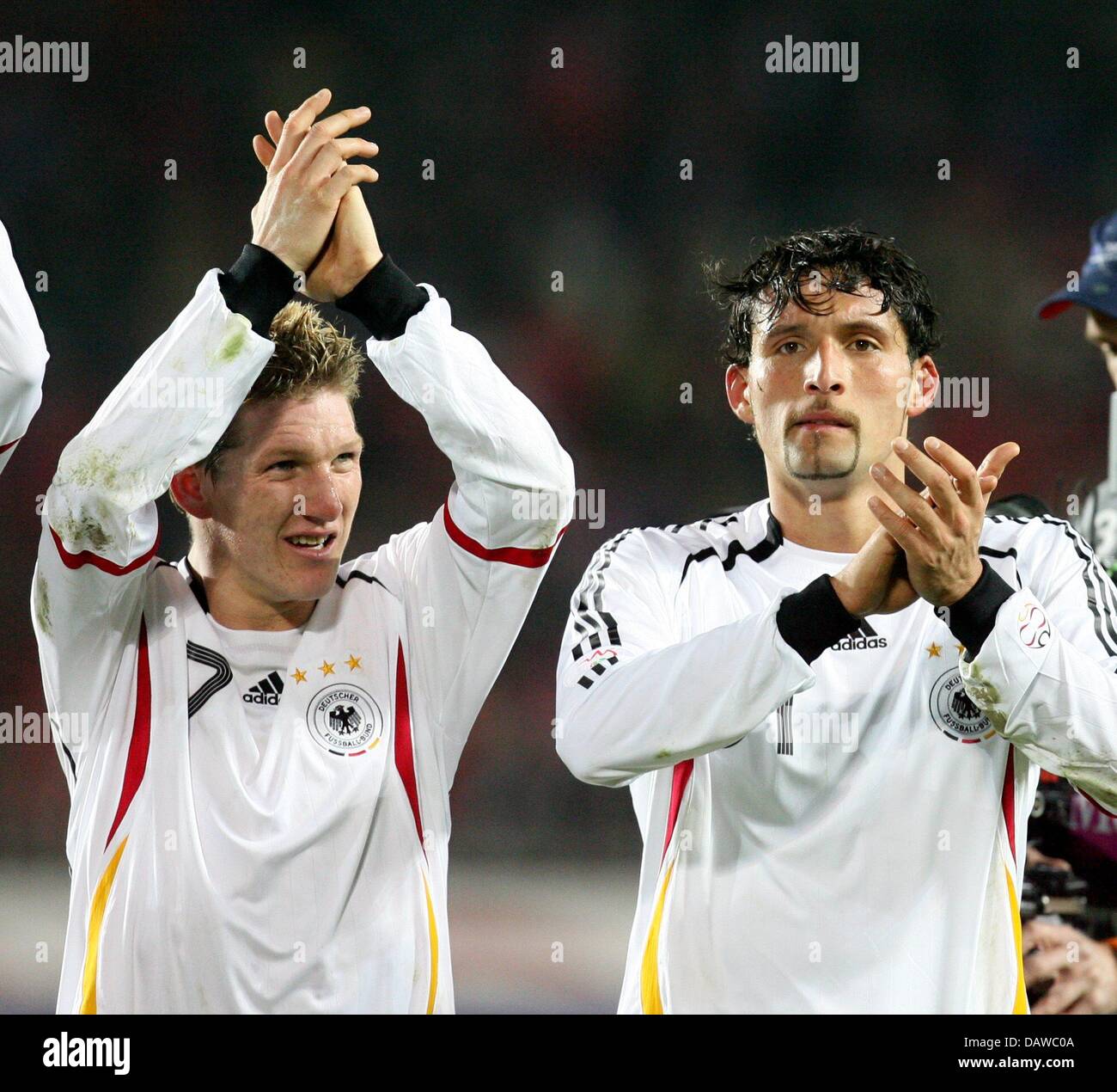 German internationals Kevin Kuranyi (R) and Bastian Schweinsteoger (L) cheer after the EURO 2008 qualifier Czech Republic v Germany at the Toyota Arena stadium of Prague, Czech Republic, 24 March 2007. German won the match 1-2 taking over the lead in the group D. Photo: Thomas Eisenhuth Stock Photo