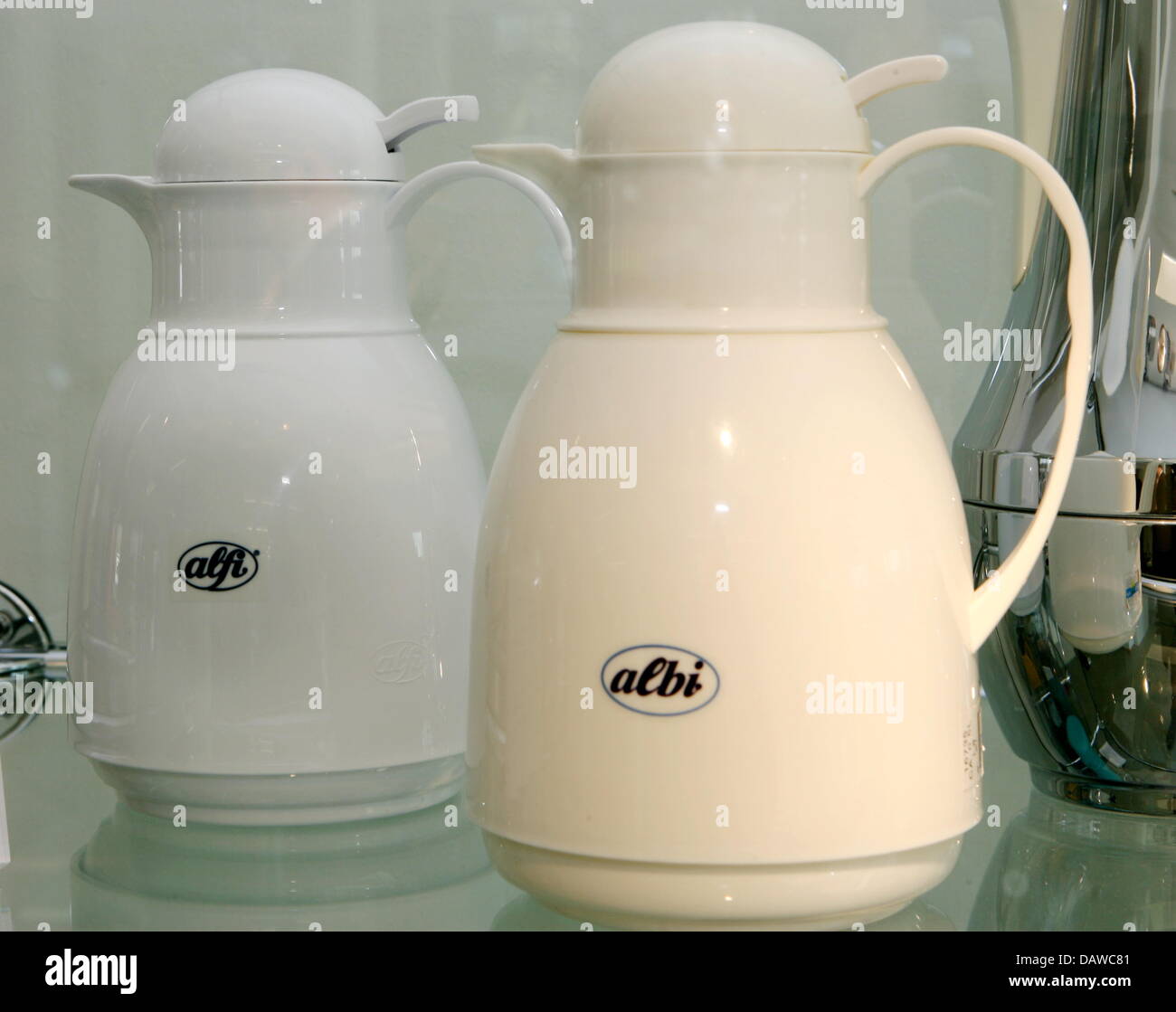 The photo shows two thermos flasks in a showcase at the 'Plagiarius