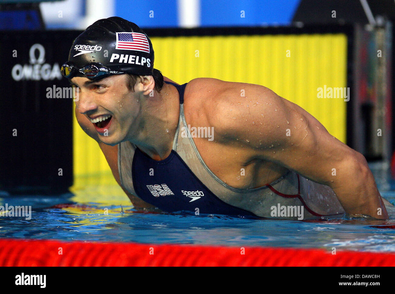 US swimmer Michael Phelps cheers winning the Men's 200m Freestyle ...