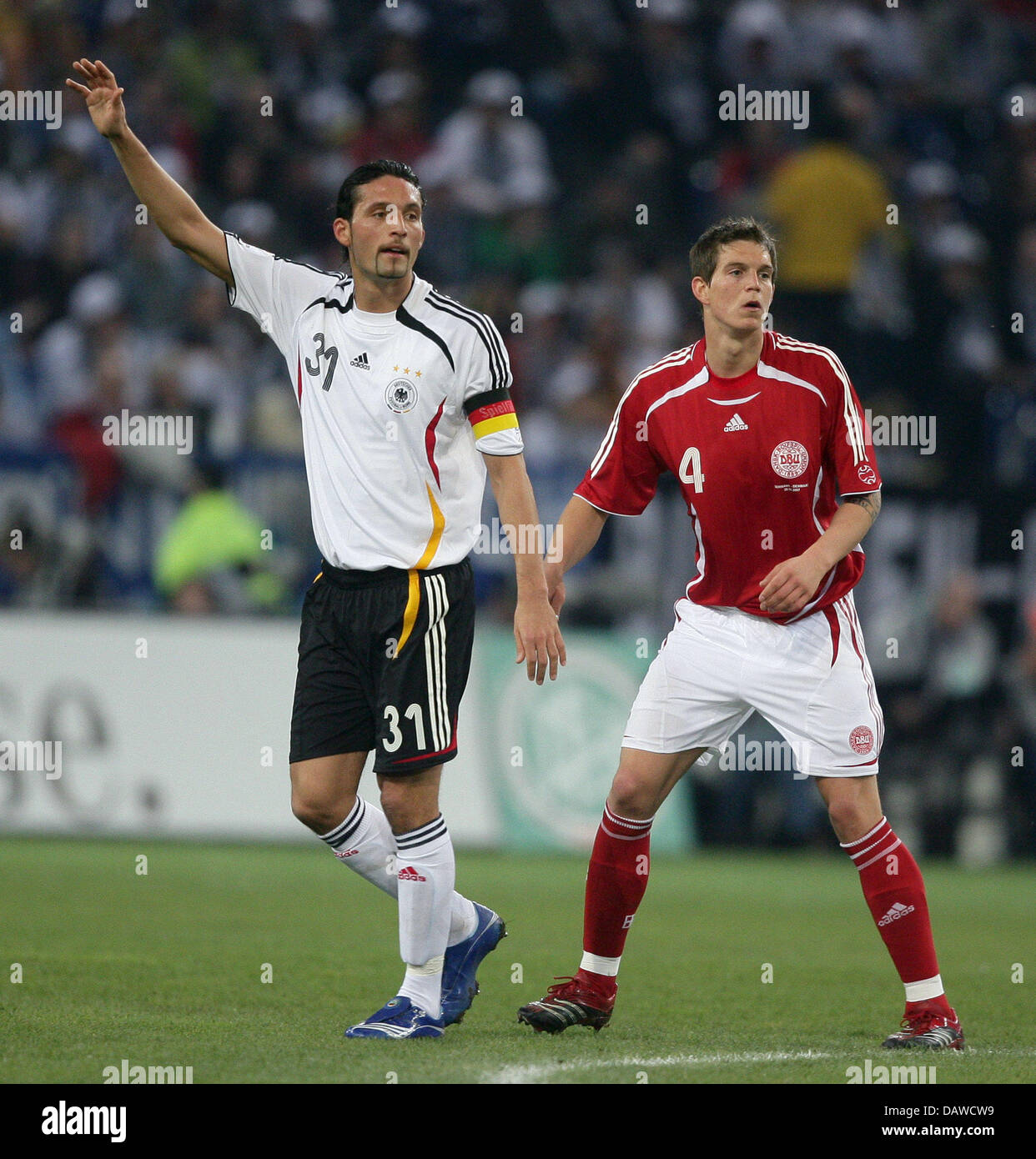 German international Kevin Kuranyi (L) lends himself to the ball during the test cap Germany v Denmark at the MSV Arena stadium of Duisburg, Germany, Wednesday, 28 March 2007. Photo: Achim Scheidemann Stock Photo