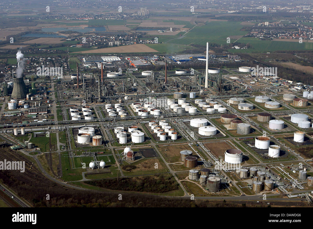 Huge oil tanks are pictured on the premises of the Shell refinery in