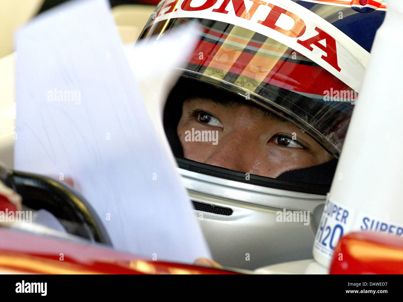 Japanese Formula 1 pilot Takuma Sato of Super Aguri F1 gestures in his racing car during the Japanese Formula 1 pilot Takuma Sato of Super Aguri F1 gestures in his racing car during the