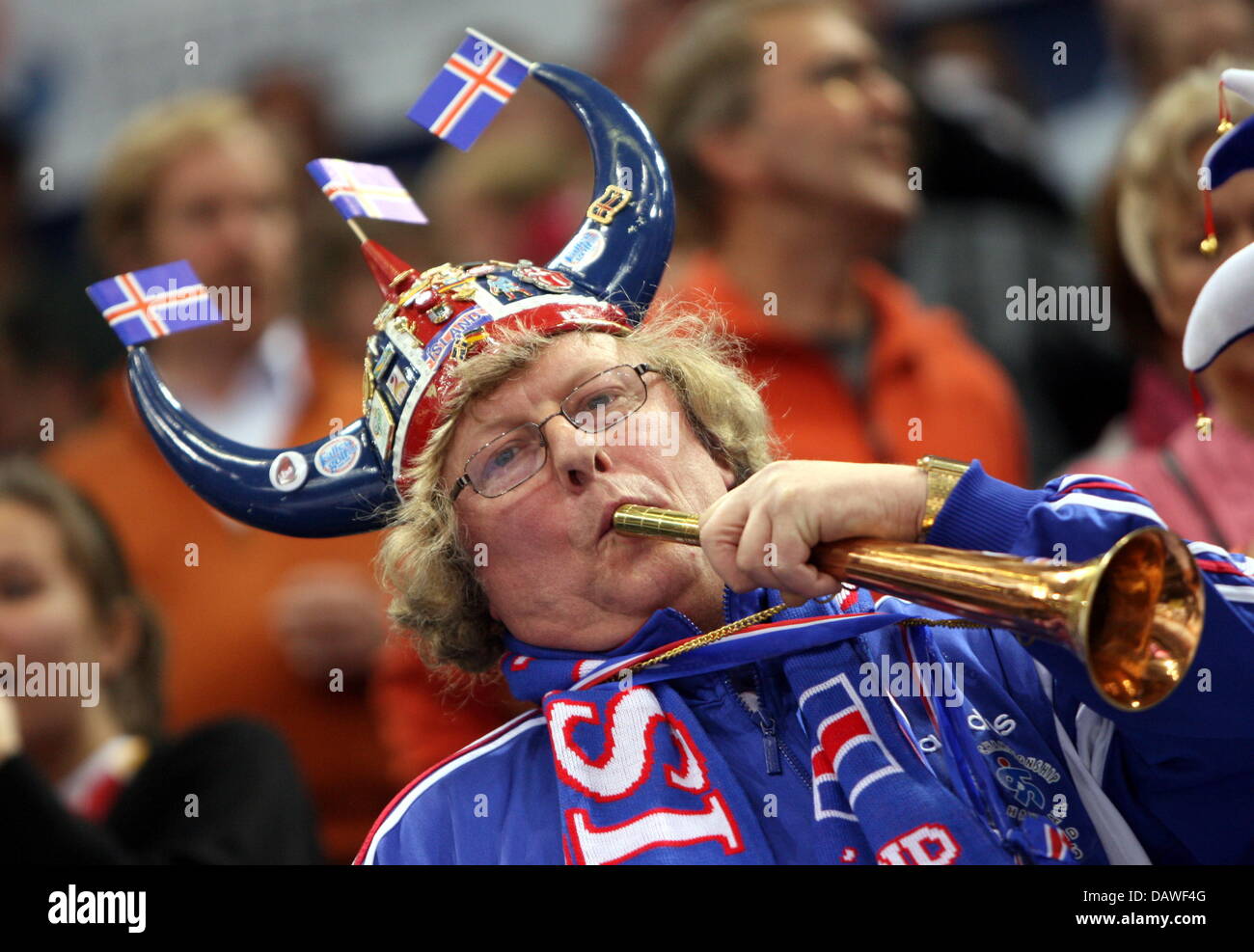 A fan of the Iceland national handball team cheers for his team in Hamburg, Germany, 30 January