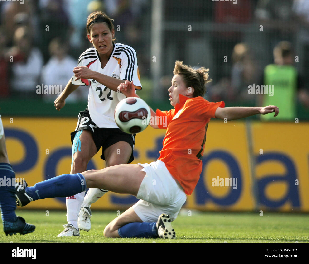 German international Linda Brsonik (L) and Dutch Karin Legemate (R) vie for the ball during the Women's Euro qualifier Germany v Netherlands at the Lohrheide stadium of Bochum, Germany, Thursday 12 April 2007. Germany defeated the Netherlands 5-2. Photo: Franz-Peter Tschauner Stock Photo