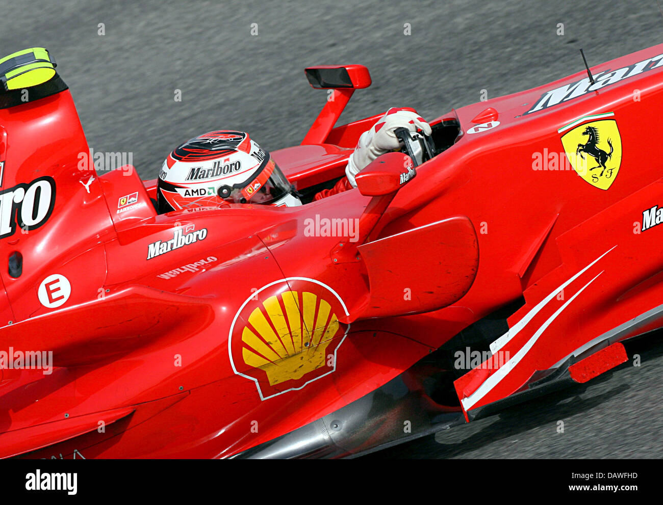 Finnish Formula One driver Kimi Raikkonen of Scuderia Ferrari steers