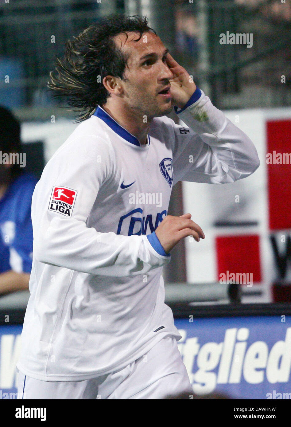 Bochum's player Theofanis Gekas holds his hand to his ear after shooting the 2:1 lead goal during the Bundesliga match between VfL Bochum and FC Schalke 04 at the Ruhrstadium in Bochum, Germany, Friday, 27 April 2007. Schalke lost 1:2. Photo: Achim Scheidemann Stock Photo