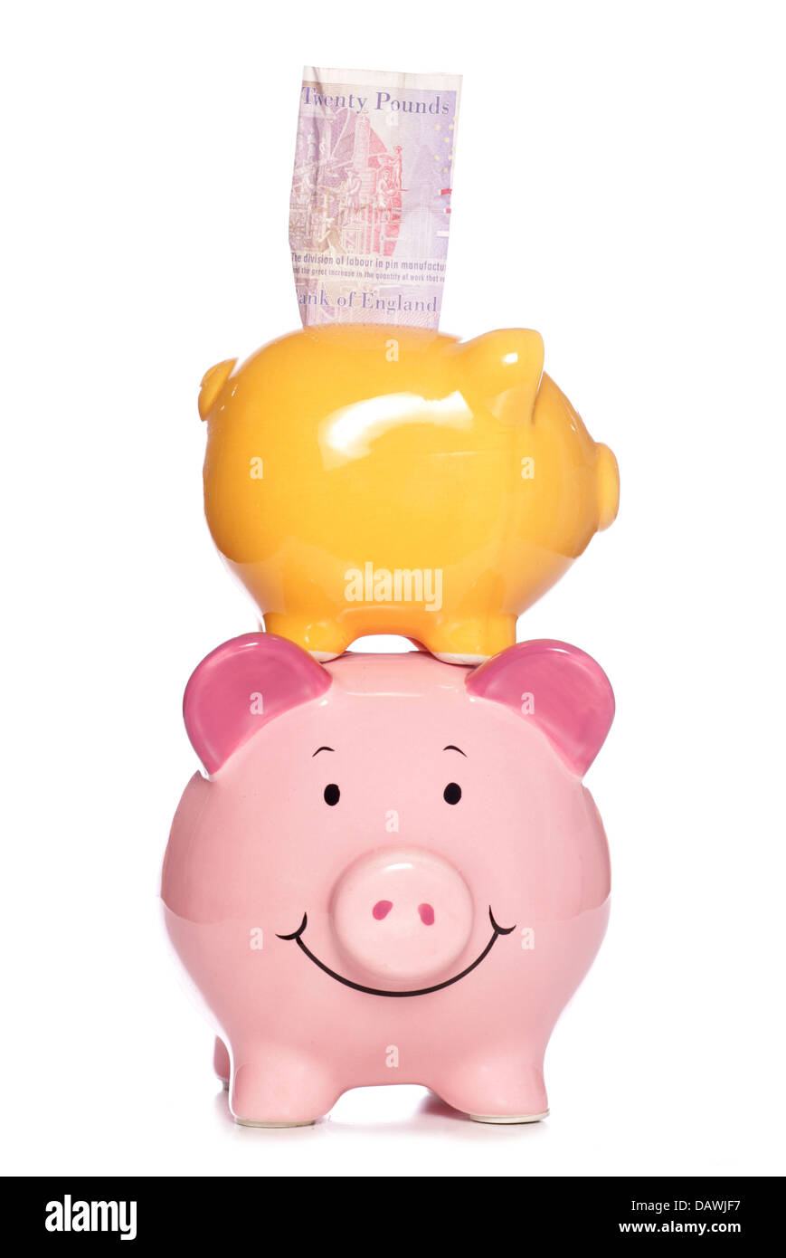 Piggy banks stacked studio cutout Stock Photo Alamy