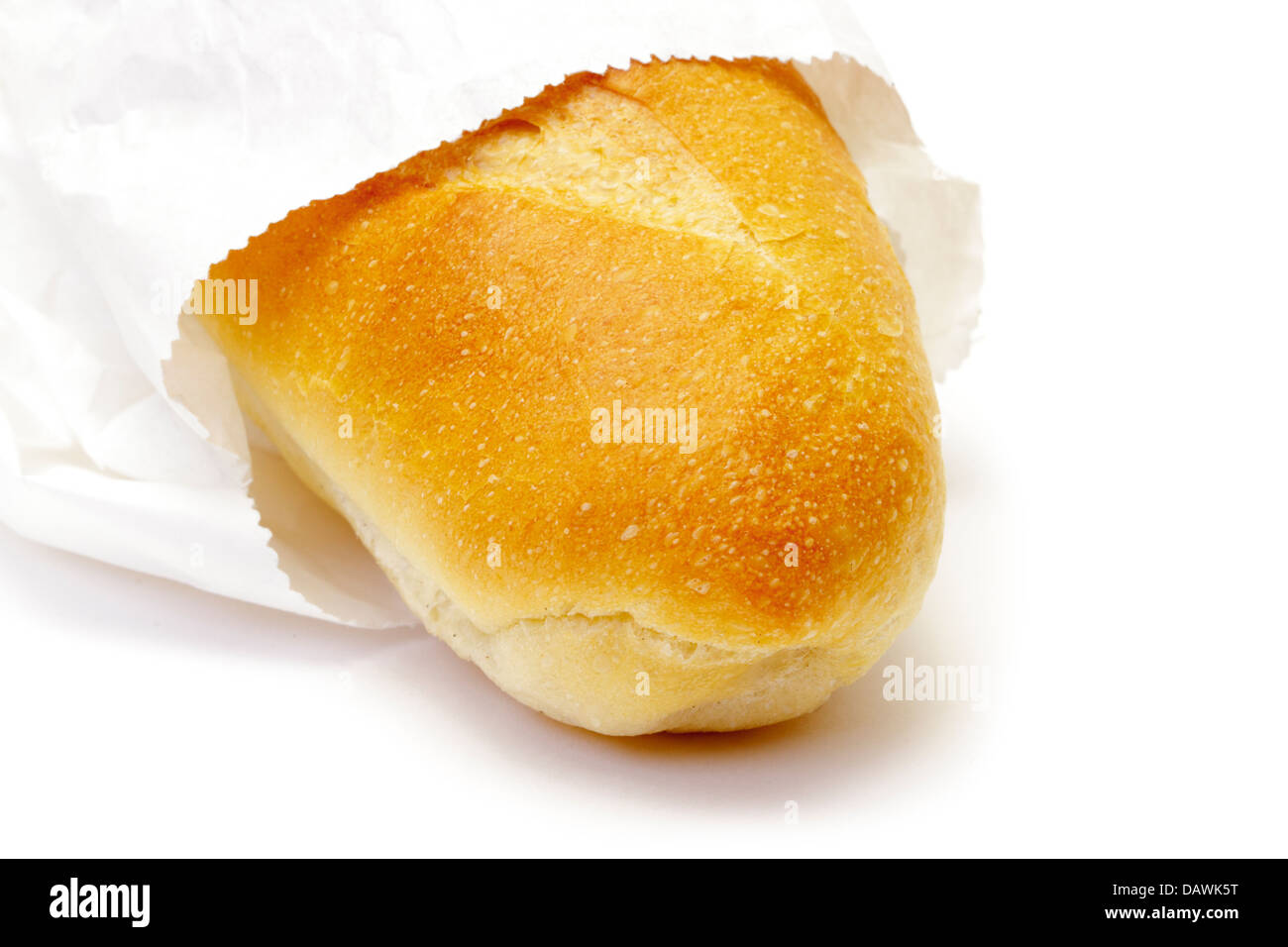 Wheat bread in paper packet on white Stock Photo