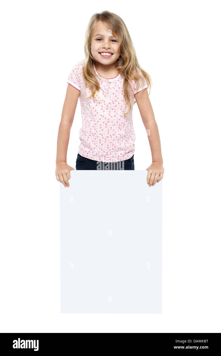 Pretty young girl showcasing blank whiteboard Stock Photo Alamy
