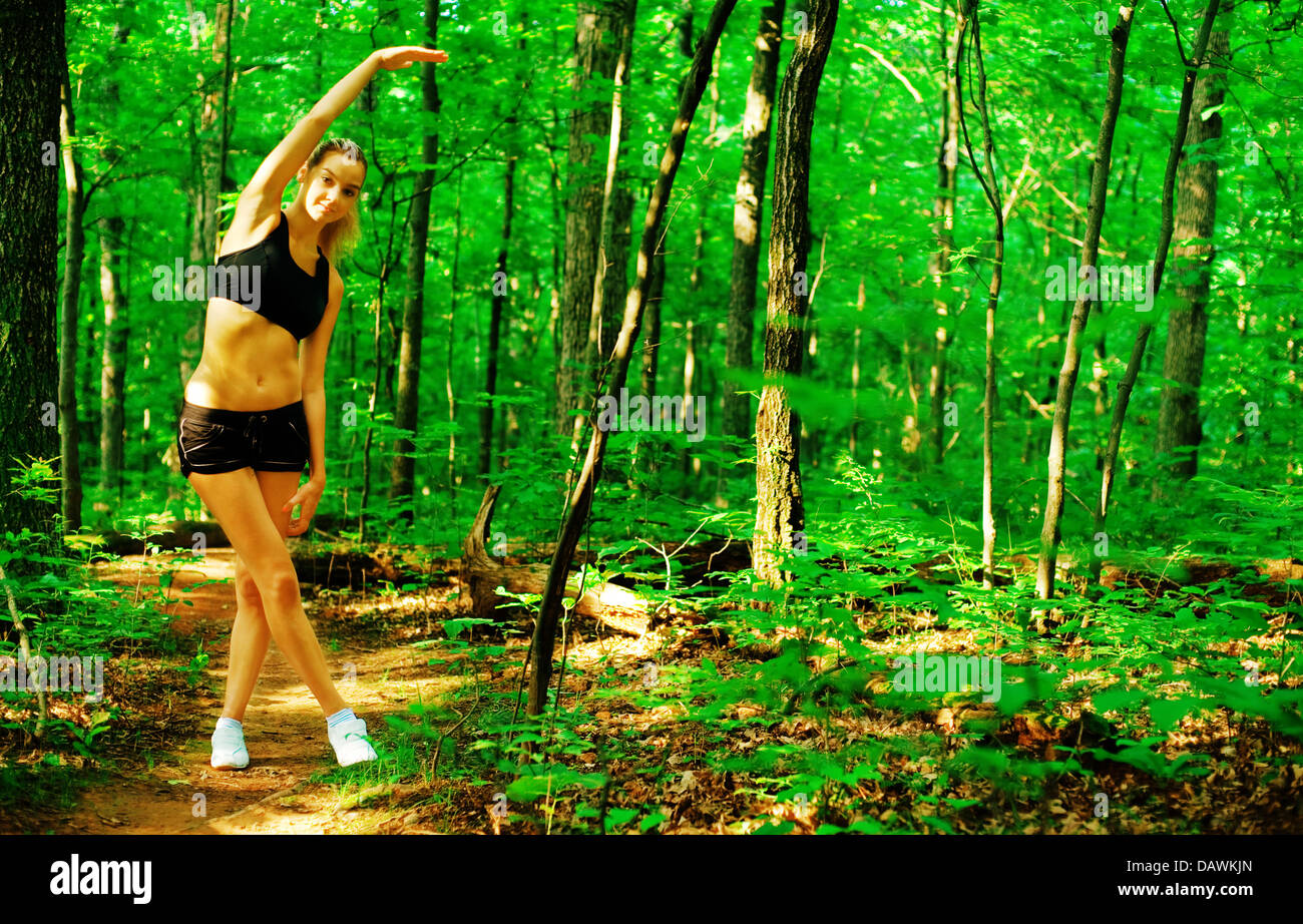Blonde Woman Exercising Stock Photo - Alamy