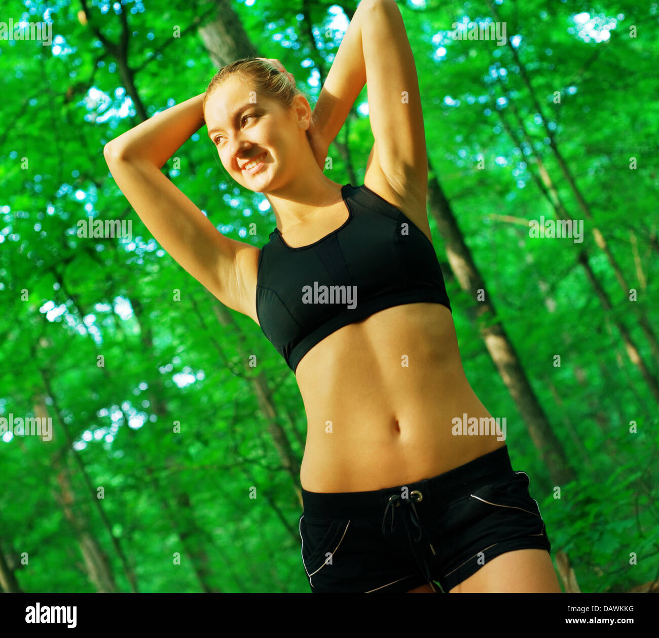 Blonde Woman Exercising Stock Photo - Alamy