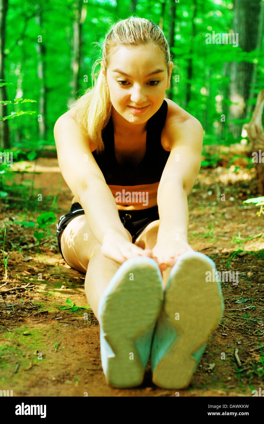Blonde Woman Exercising Stock Photo - Alamy