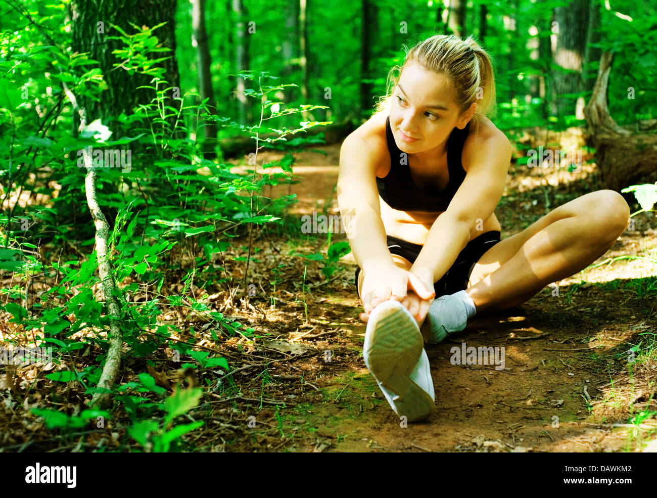 Blonde Woman Exercising Stock Photo - Alamy