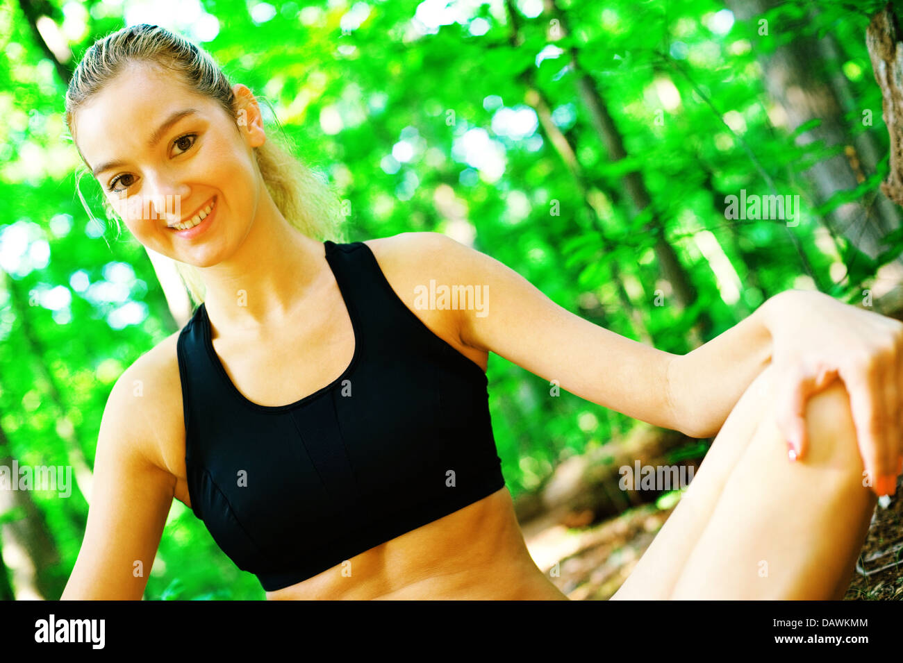 Blonde Woman Exercising Stock Photo - Alamy