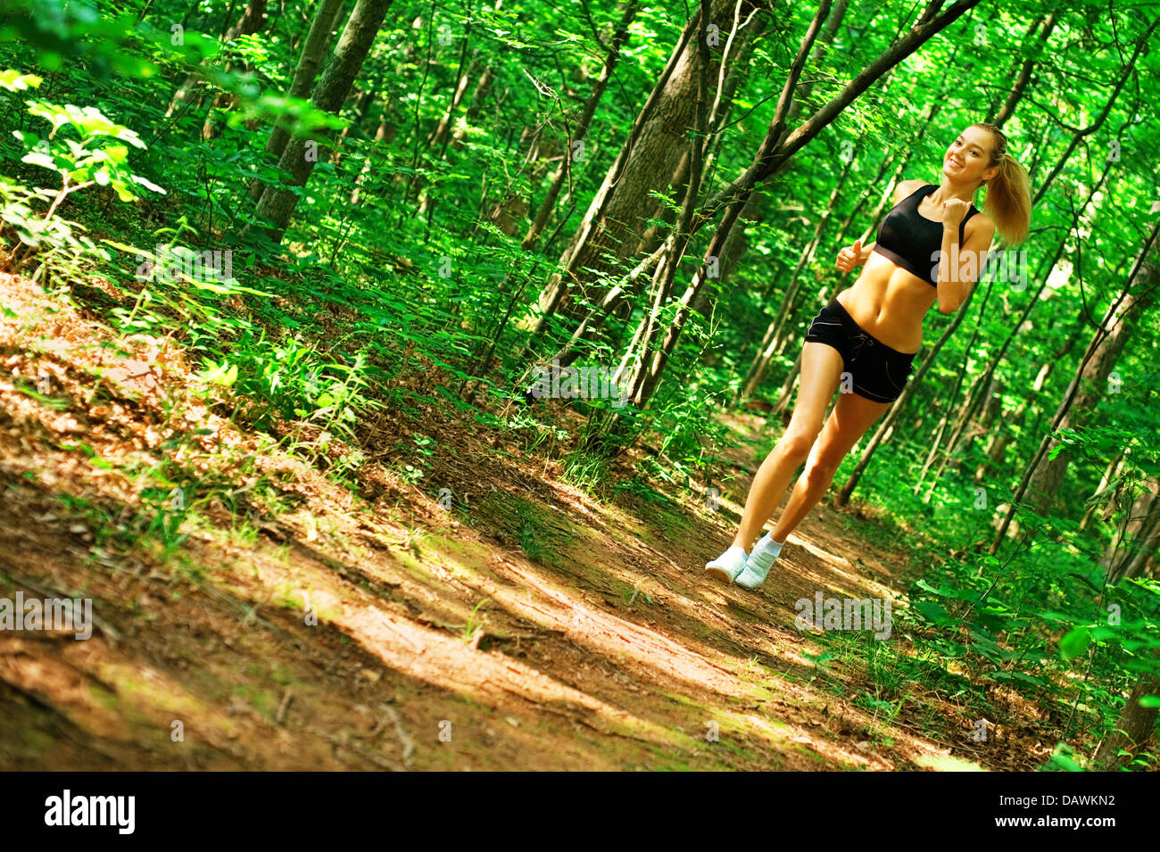 Blonde Woman Exercising Stock Photo - Alamy