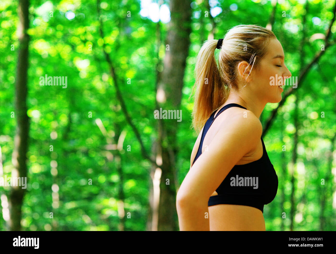 Blonde Woman Exercising Stock Photo - Alamy