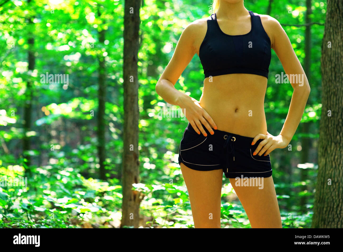 Blonde Woman Exercising Stock Photo - Alamy