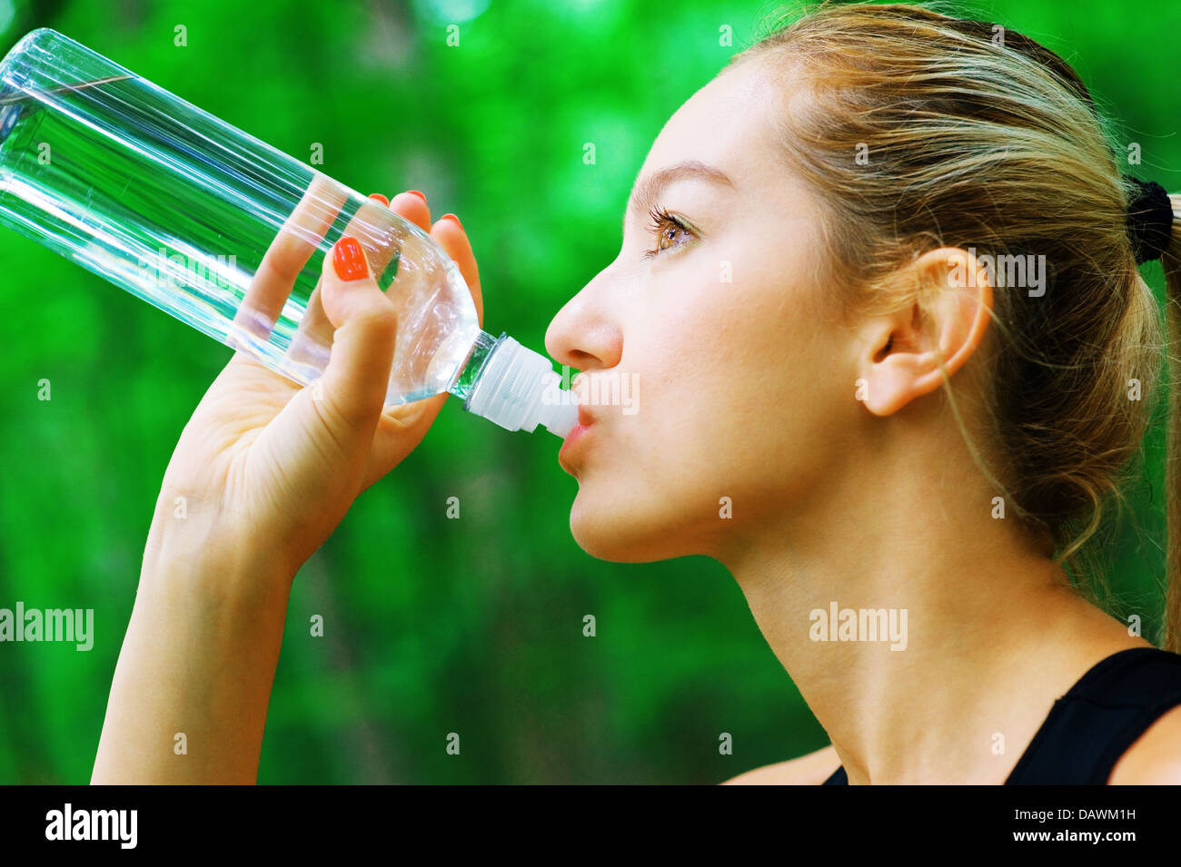 Blonde Woman Exercising Stock Photo - Alamy