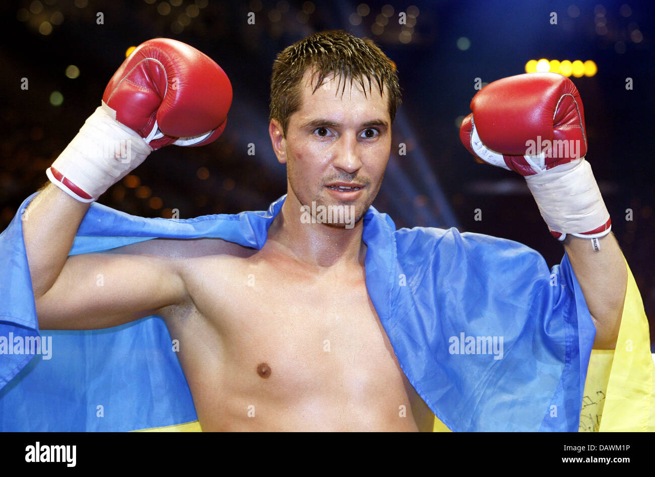 Ukranian boxing pro Sergiy Dzinziruk celebrates winning the WBO