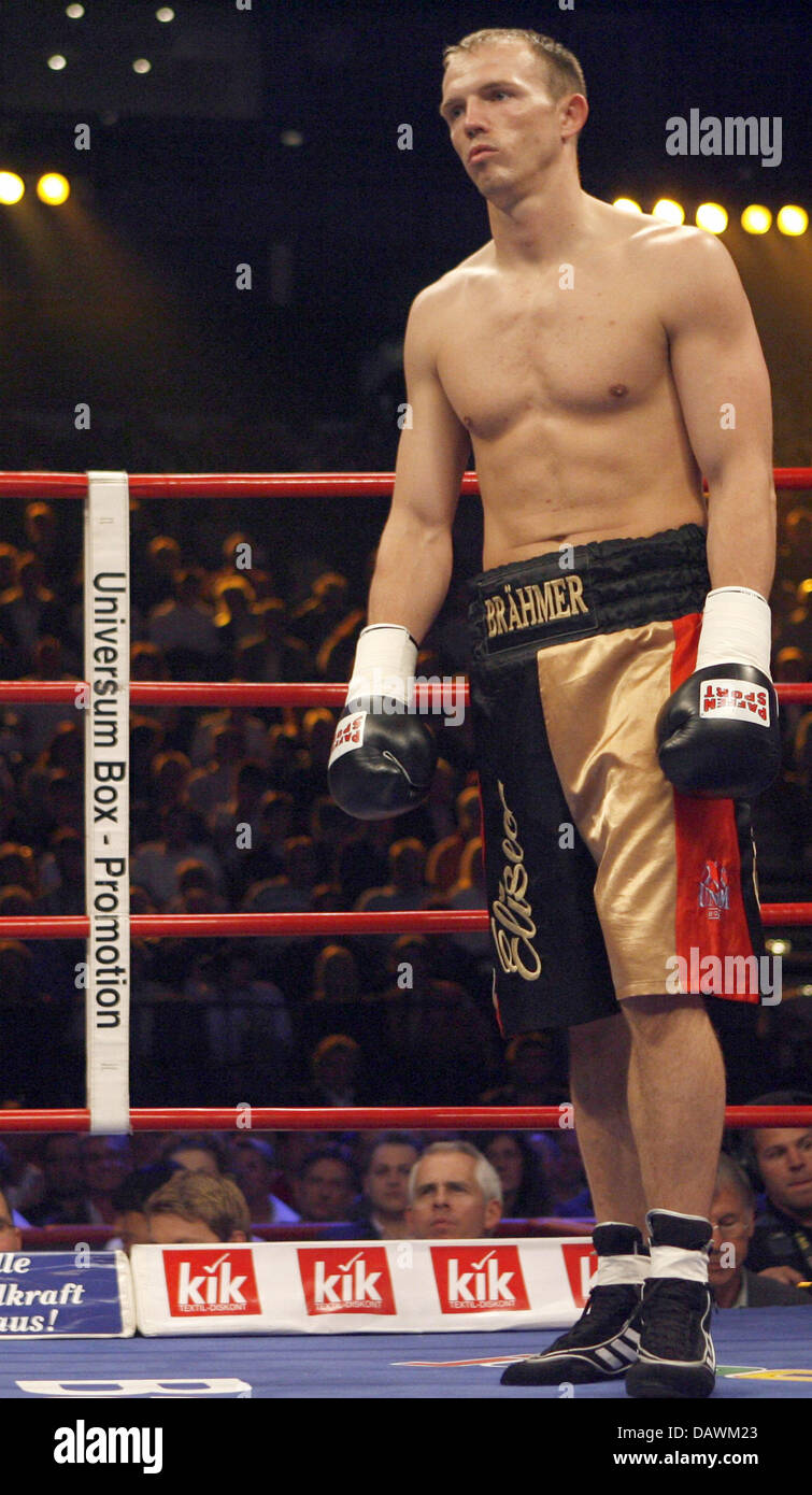 German boxing pro Juergen Braehmer gets in the ring to fight Argentine