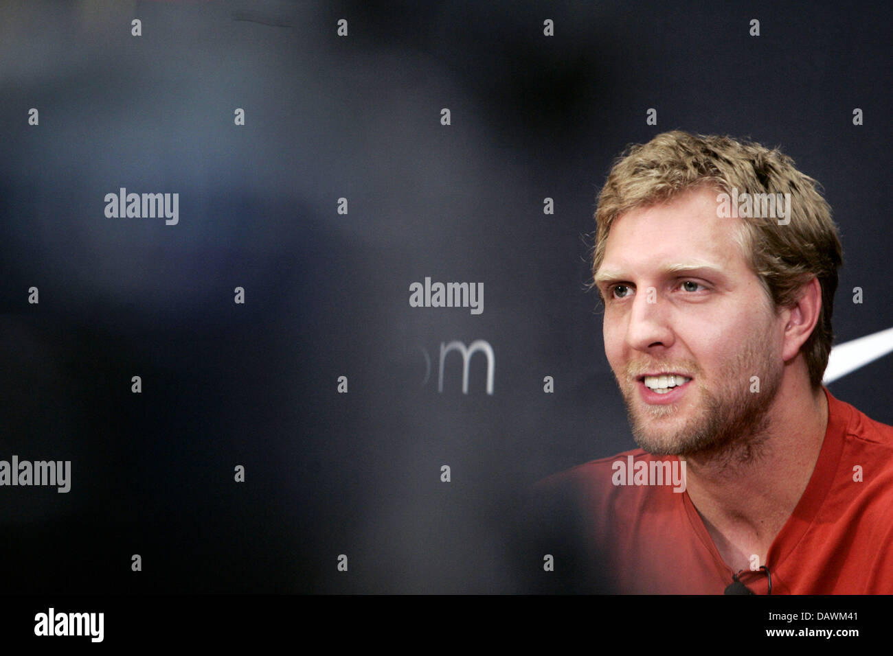 German basketball pro Dirk Nowitzki smiles at a press conference in Frankfurt Main, Germany, 22 May 2007. Nowitzki was elected MVP of this year's NBA season being the first-ever European to be granted this award. Photo: Frank May Stock Photo