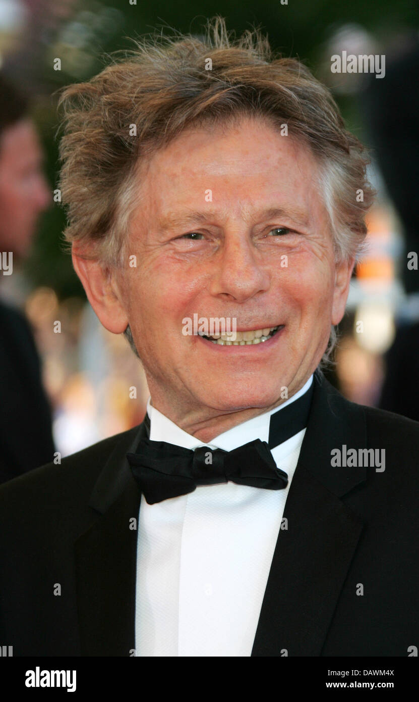 Filmmaker Roman Polanski smiles for the cameras as he arrives at the ...
