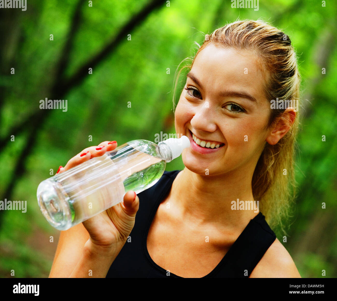 Blonde Woman Exercising Stock Photo - Alamy