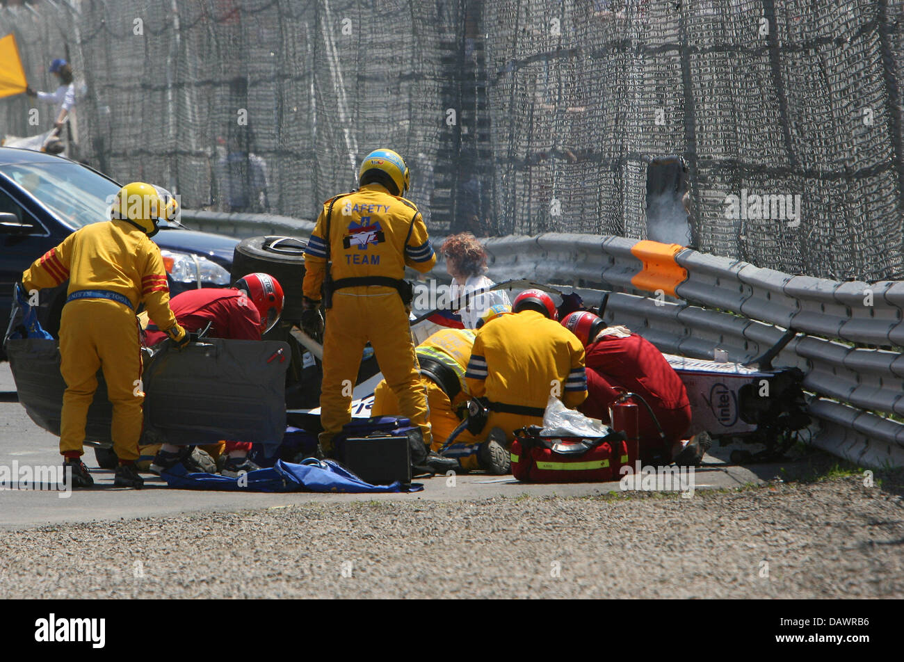 Polish Formula One Driver Robert Kubica Of Bmw Sauber Is Looked After Stock Photo Alamy