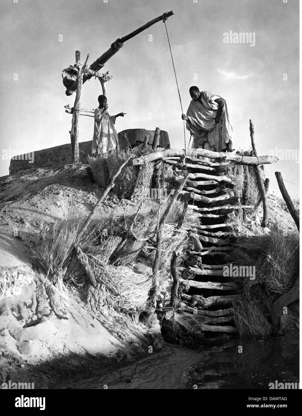 geography / travel, Mali, agriculture, man and boy at a well used for watering the fields, Timbuktu, circa 1950s, Additional-Rights-Clearences-Not Available Stock Photo