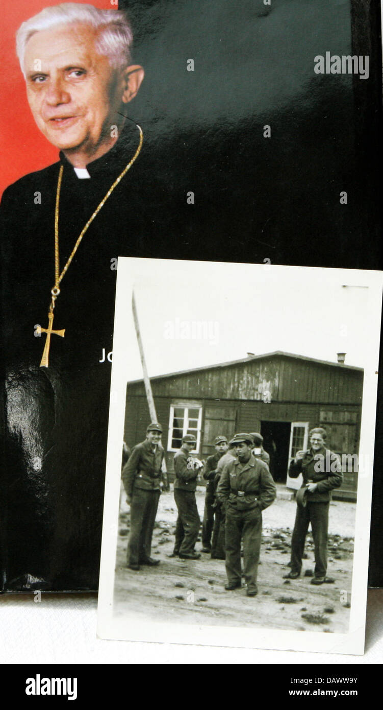 The picture shows a black and white photography of Joseph Ratzinger (2nd from L), now pope Benedict XVI in front of a book with Ratzinger's photo on the cover, in Rosenheim, Germany, 11 June 2007.  Photo: Matthias Schrader Stock Photo