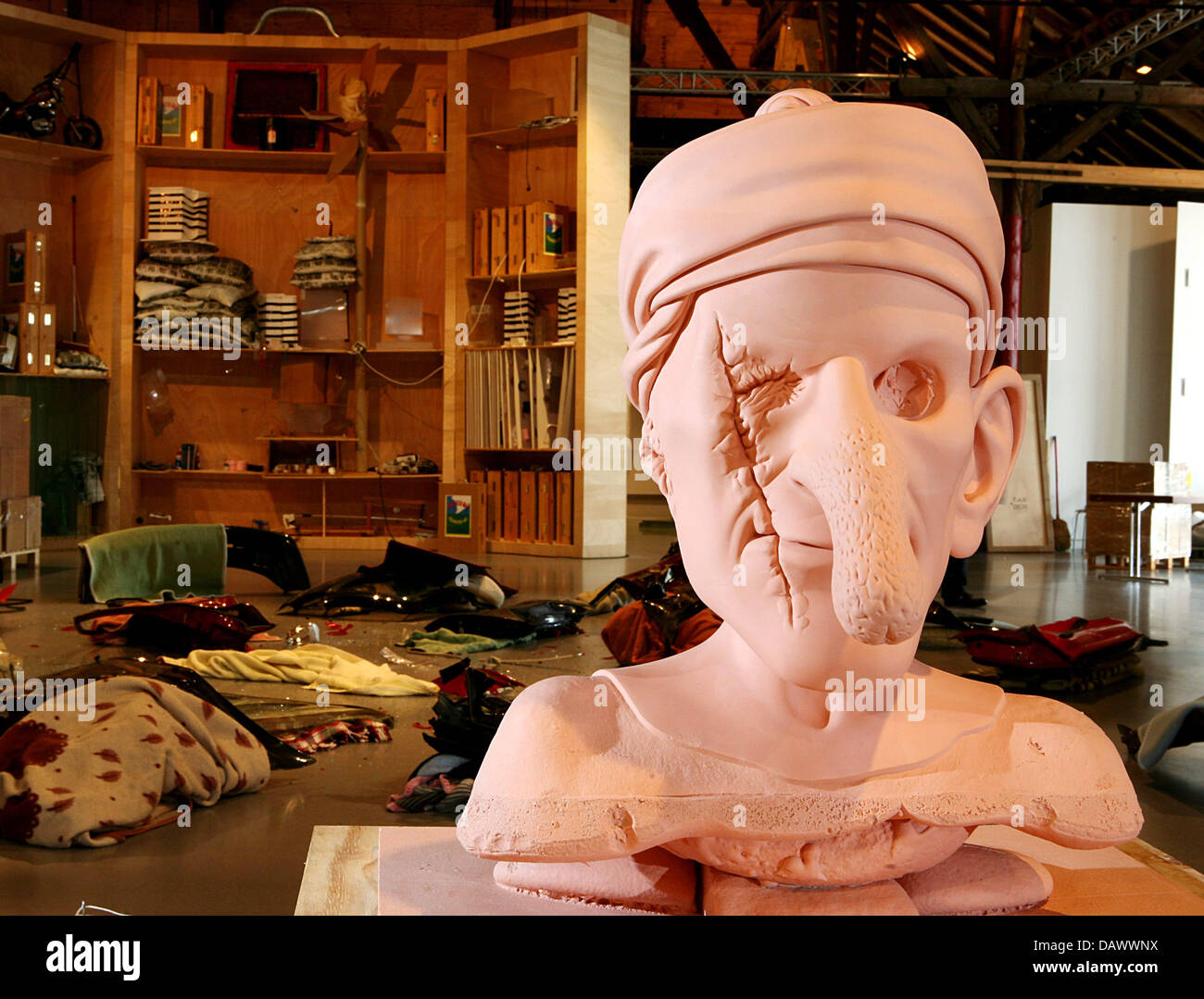 A visitor of the 10th 'Triennale Kleinplastik' looks at the sculpture of pirate Jack by Paul McCarthy at the 'Alten Kelter' in Fellbach, Germany, 23 June 2007. On 2.500sqm exhibition space sculptures by 50 international artists are on display under the motto 'Bodycheck' from 23 June 2007 to 23 September 2007. Photo: Bernd Weissbrod Stock Photo