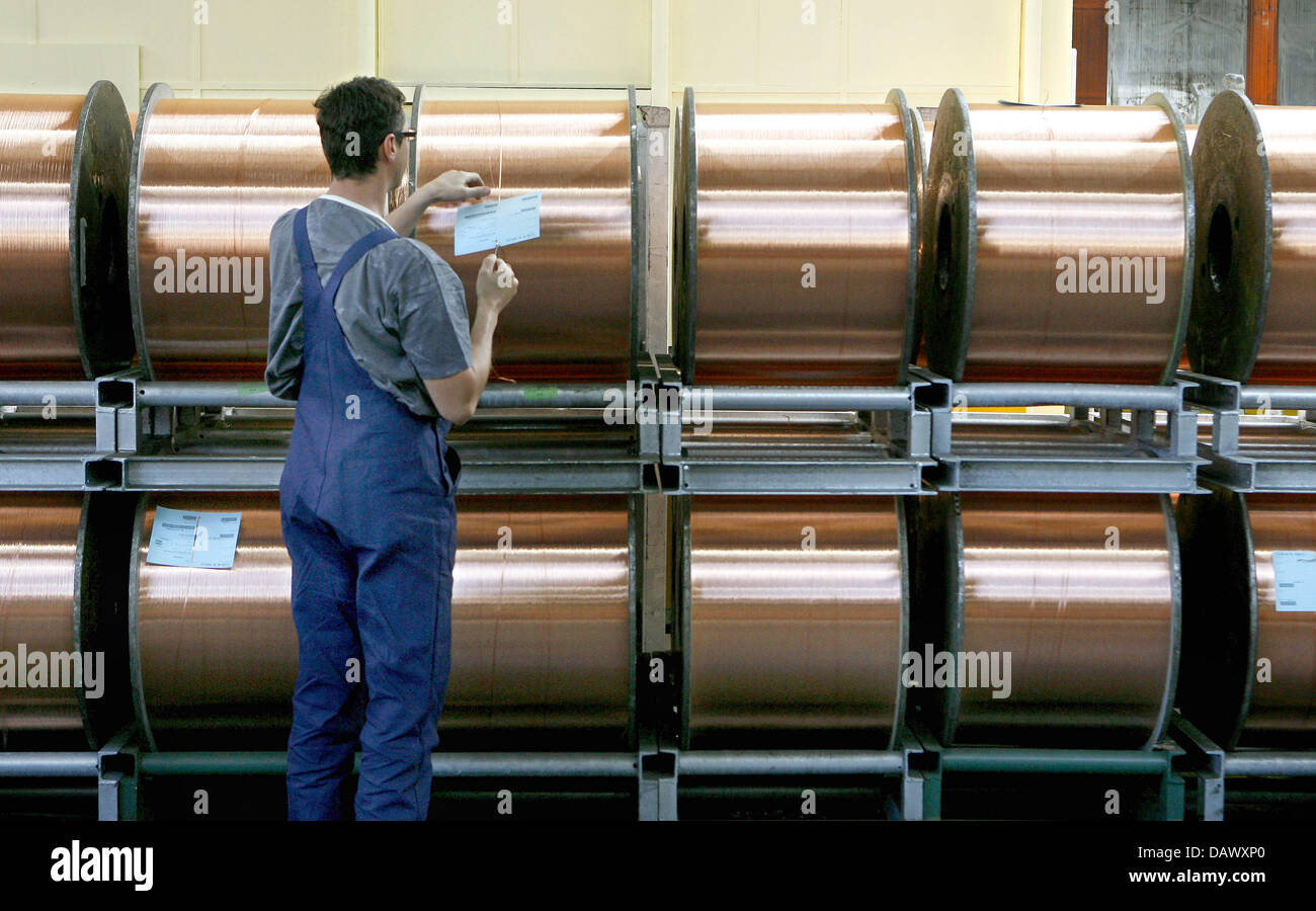 Leoni Roth Staff of special cables producer LEONI pictured with copper wire in ...